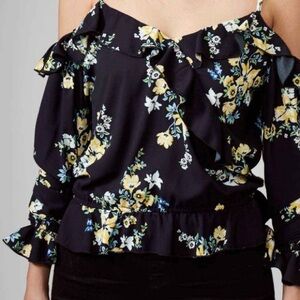 Divided Black Ruffled Floral Blouse